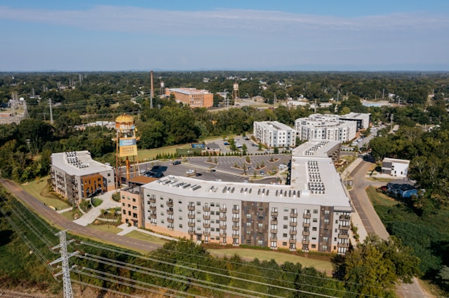 Modern apartment buildings with trees and greenery