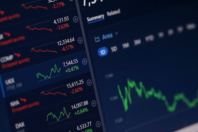 Trading screens with financial data representing trade finance